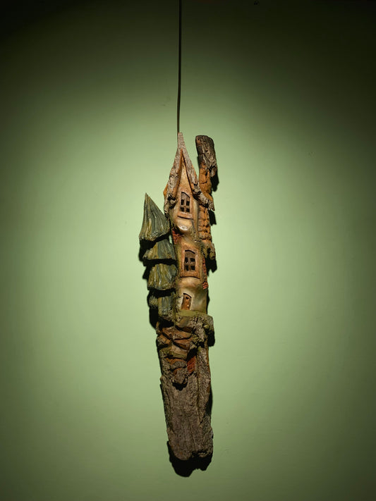 Hanging Bark House With A Tree